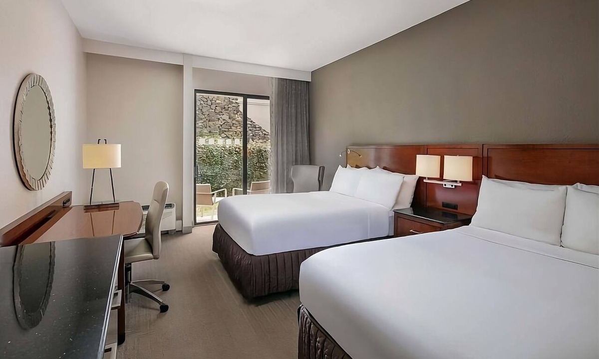 Executive Park Hotel | Comfort and Convenience! 3 Convenient Units, Pet-Friendly, Parking, Pools!