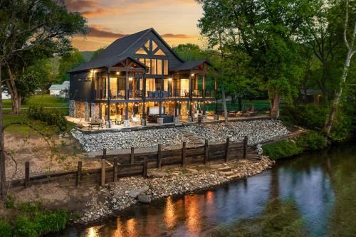 Townsend House | Highly Rated New Riverfront Cabin Full of Windows Hot Tub Pool Table Sleeps 12