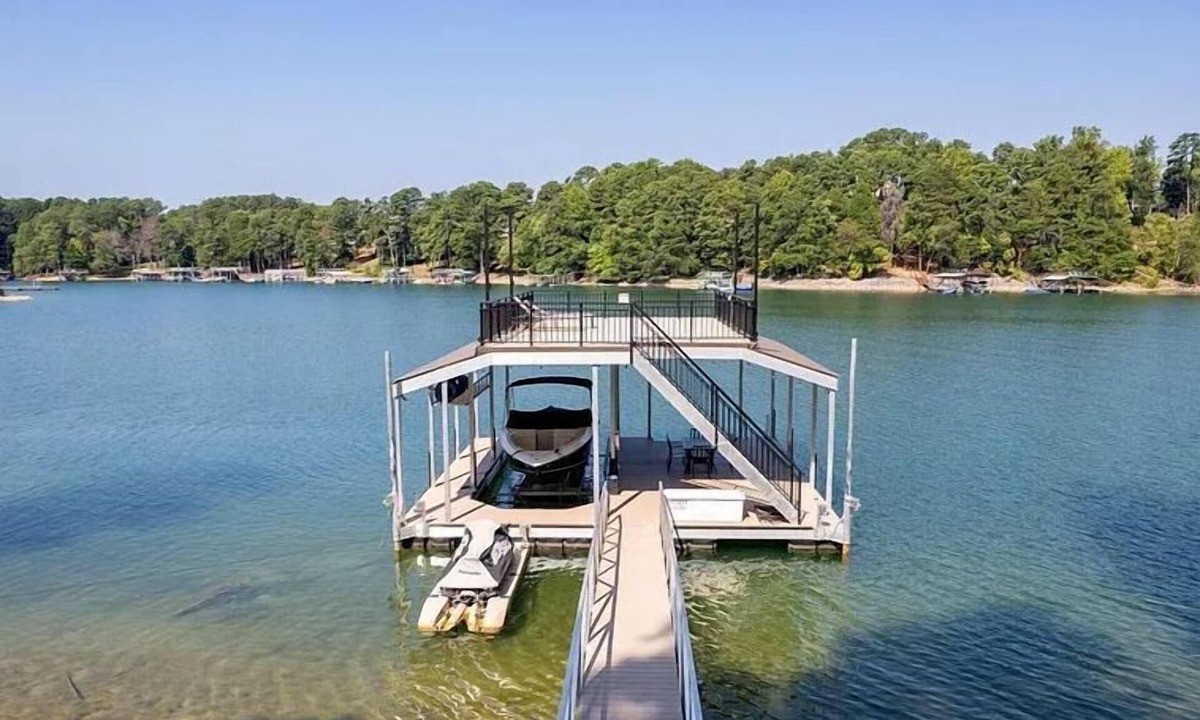 Buford House | Lake Lanier Luxury Water Front Retreat with Large Dock, Boat Rental & Lake Views