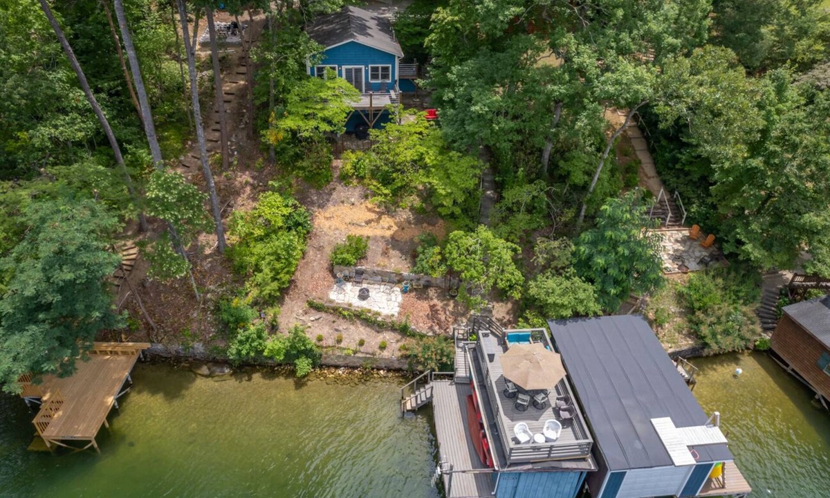 Sunset Cove House | Max's Blue Lakeside Cottage | Pet Friendly Lake Lure Cabin with Private Dock & Boathouse Deck