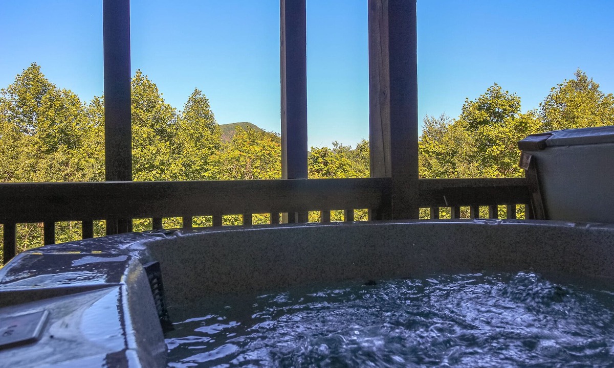 Buck Mountain Cabin | Rest Assured: Mountain View Cabin w/Hot Tub, Game Room & Fenced Dog Run!