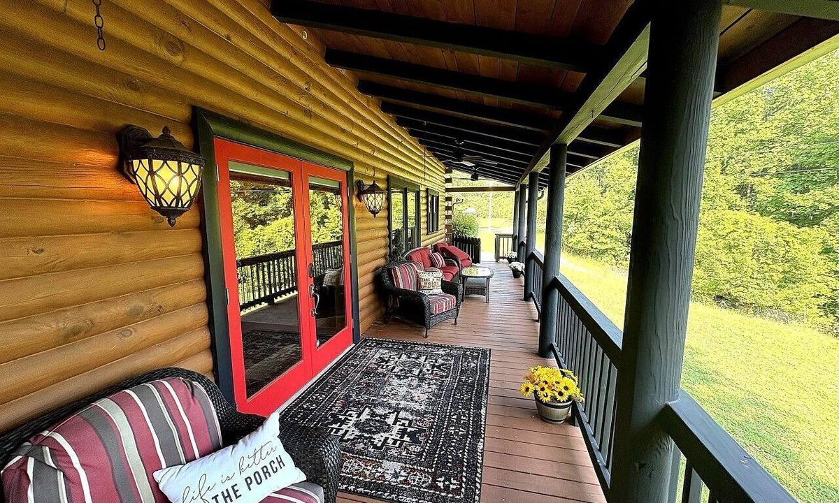 Mount Airy Cabin | Rustic Log Cabin with Hot Tub & Wraparound Porch in Mount Airy, North Carolina
