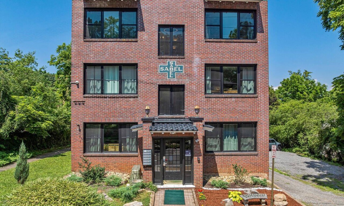 Charlotte Street House | The Sabel Collection | Downtown Asheville retreat with 16 suites parking, Wi-Fi.