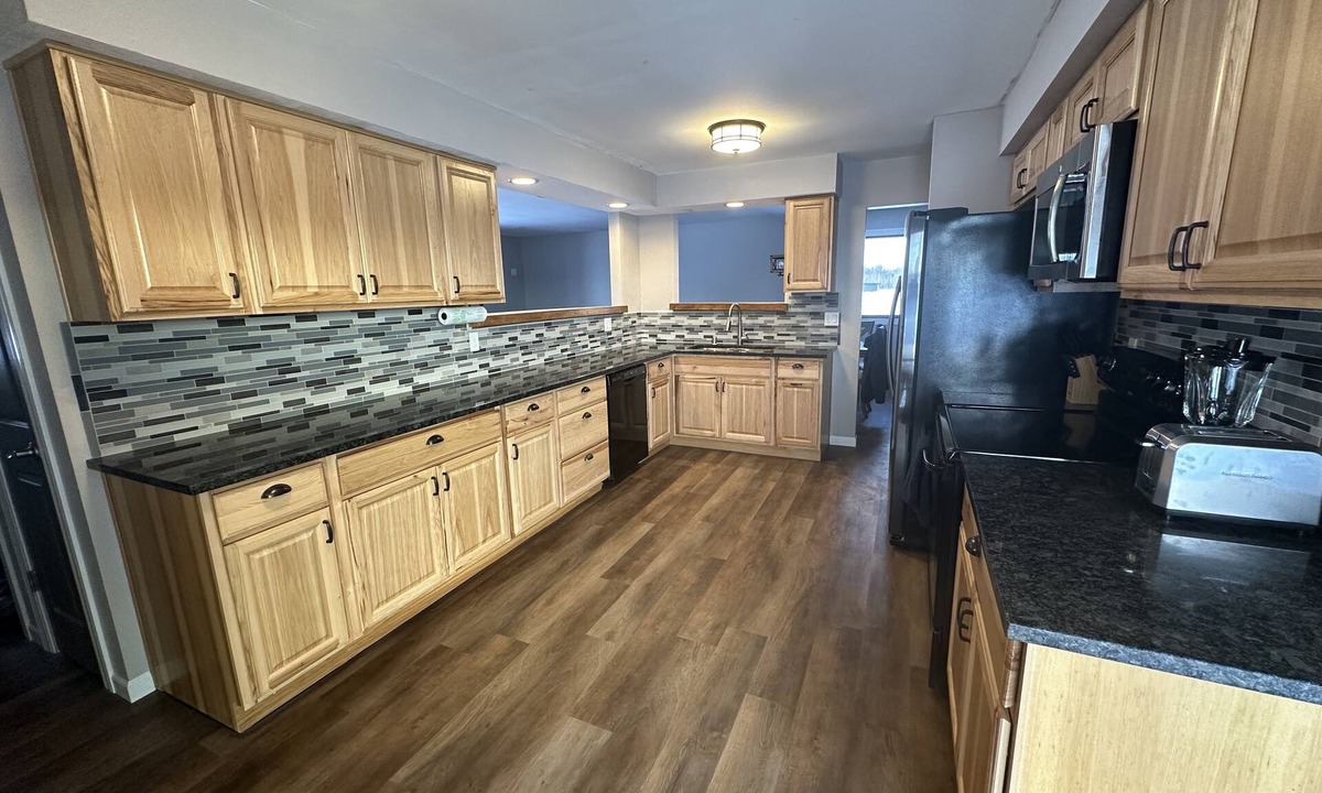 Waldo House | Three bedroom ranch style pet friendly home with a patio & theatre room!