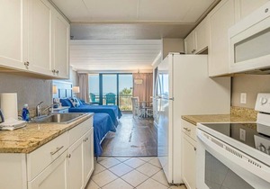 Great 1st floor unit that looks right out onto the beach with direct access