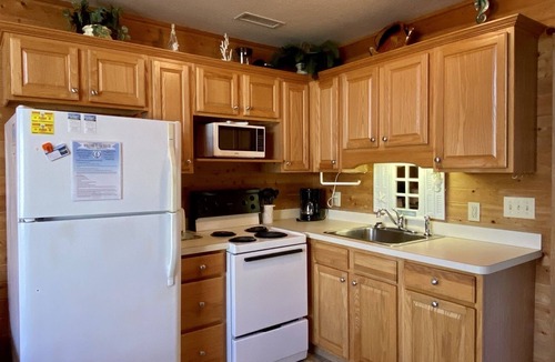 Hatteras Cabin | 11 Mystical Sundaze Studio Bedroom Condo by RedAwning