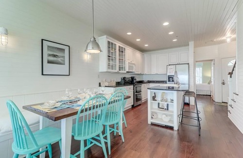 Waters Edge House | 124 Waters Edge! Riverfront Town Home! Screened porch, Community Pool, & Fishing Dock!