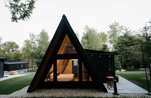Pepin Cabin | Birch A-frame cabin nestled on the Woods & Co Weddings + Events property