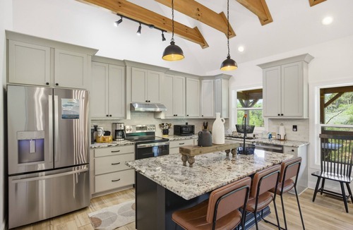 Sevierville Cabin | Black Bear Cove | Lakefront Stay w/Hot Tub, Game Room, Fire Pit, Dock + Kayaks