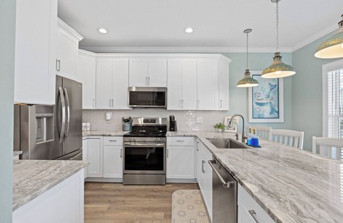 Ocean Isle Beach Villa | Castaway the Day - Second Row -closest walk to beach access, pool, and tiki bar!