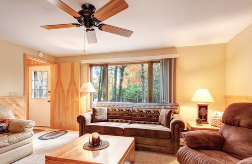 Eagle River Condo | Charming lakefront condo w/ gas fireplace, private deck close on chain of lakes!