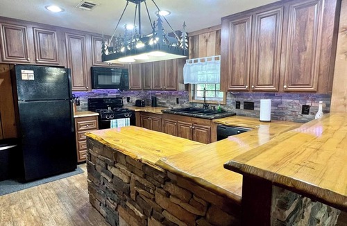 Edwards Cabin | Charming Lakeside 2-Bedroom Cabin with Pool and Firepit in Peaceful Edwards, MS