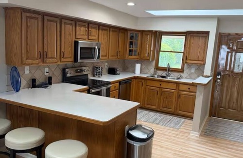 Oscoda House | Come for the Lake, Stay for the S'mores! 4bdrm Lakefront Retreat w/Private dock!