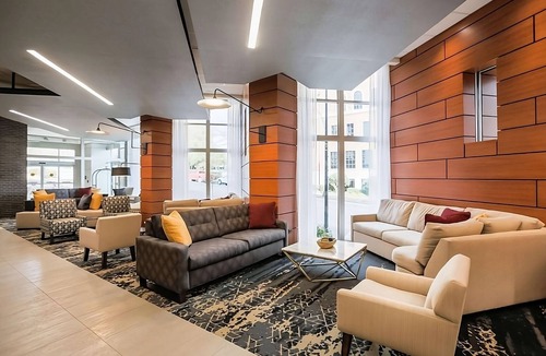 Greenville Downtown Apartment | Comfortable King Suite | Pool Access, Beach Nearby & Scenic Views