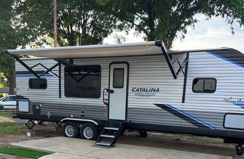 Harrisburg RV Rental | Cozy campground with WiFi and AC. Walk to the Charlotte motor speedway.