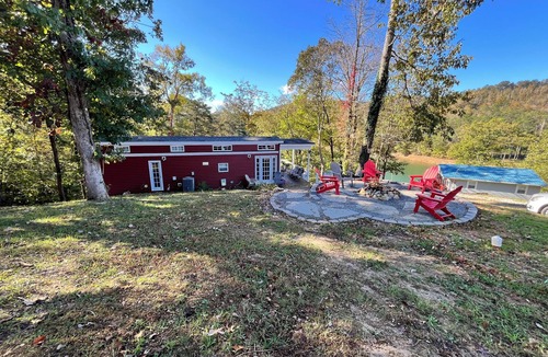 Speedwell Cabin | Cozy waterfront loft retreat with private dock, and lake access.