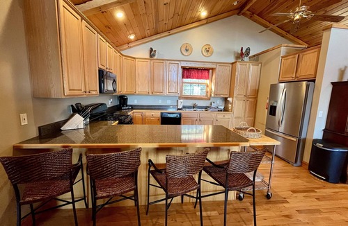 Wolf Laurel House | Escape to serene mountain bliss in this stunning mountain home.