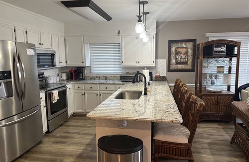 Ash House | Escape to this stunning oceanfront vacation home in Sunset Beach, NC.