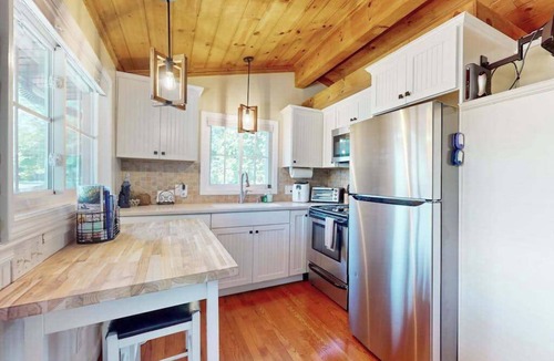 Sunset Cove Condo | Escape to Tranquility: Cozy Cabin Retreat with Dock & Outdoor Living