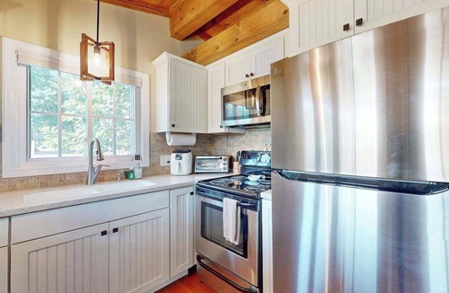 Sunset Cove Condo | Escape to Tranquility: Cozy Cabin Retreat with Dock & Outdoor Living