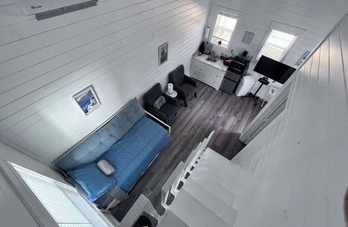 Cape Girardeau Cottage | European Inspired Lofted Cottage in Tiny Home Village