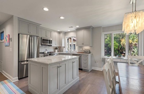 West Beach Village Villa | Fairway Oaks Villa! Lagoon views! Short 5-7 minute stroll to the beach!