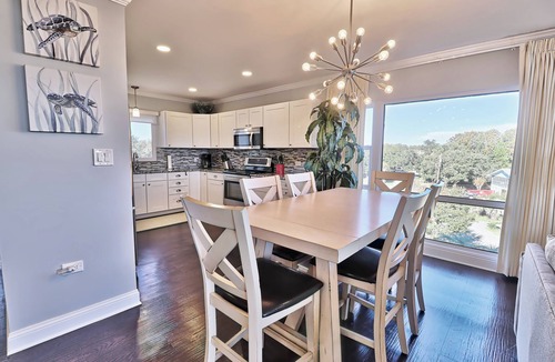 North Litchfield Beach Condo | Fourth Floor Condo across from Beach Access, Balcony, Pool, Grill Area, Elevator