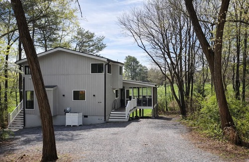 The Woods House | Golf days, game room/pool passes/coffee bar at Fairway Vista on the 2nd fairway.