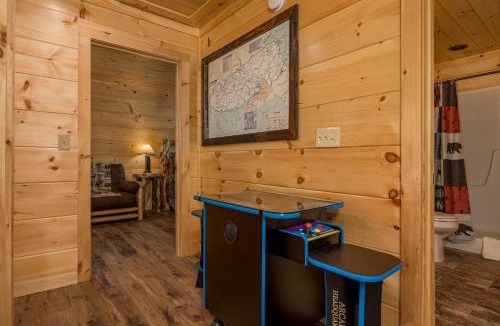 Chalet Village Ski Chalet | Hidden Gem Cabin for up to 10 with Wi-Fi, game room, hot tub and swim spa, close to town, private