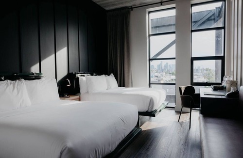 East Nashville Hotel | Immerse in Art at Trendy Guest House with Stunning Skyline Views & Rooftop Bar