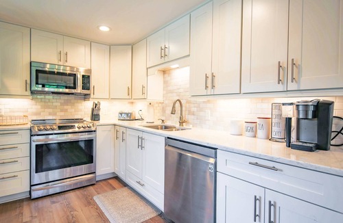 Harbour Town House | In the Heart of Harbour Town! Gorgeous, End Unit Townhome w/Community Pool & Outdoor Balconies!