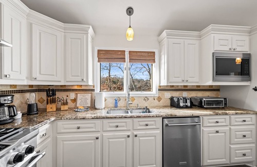 Rock Hill House | Lake House Fire Table Sunset