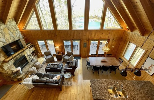 Six Mile House | Lakefront house with multiple outdoor areas, fire pit, dock and two kayaks