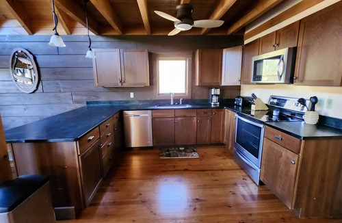 Butler Cabin | Lakefront Lullaby-Rustic cabin w/lake views, boatslip, hot tub & fiber internet