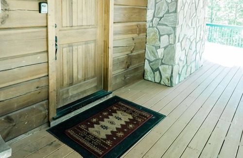 Sunset Cove Cabin | Lakeview cabin - upper and lower deck, fireplace, game room, open floor plan