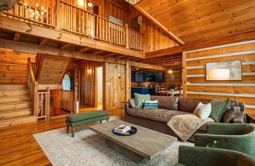 Wolf Laurel Cabin | Minutes from Hatley Pointe Ski & Bike Resort, this mountain cabin features a private hot tub, movie room, hiking trail access to the Appalachian Trail & Big Bald, family-friendly amenities, and exclusive Village Club and Country Club access.