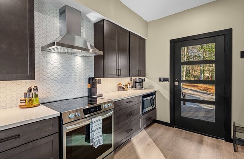 Skyland House | Modern Asheville Cabin with Hot tub, Fire Pit & EV charger
