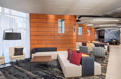 Greenville Downtown Apartment | Modern King Room | Downtown Location, Pool & Beach Access