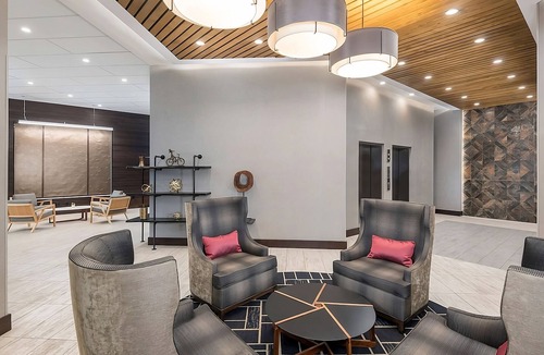 Greenville Downtown Apartment | Modern King Room | Downtown Location, Pool & Beach Access
