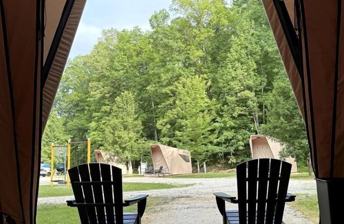 Hitchins RV Rental | Modern Safari Tent Rental with AC and Trails in Grayson, Kentucky