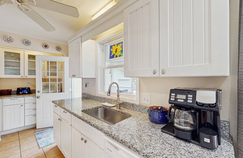 Old Village House | Old Village hideaway with covered porches, grill, alfresco dining & fenced yard
