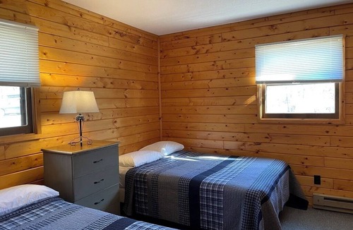 Walker Resort | Overlook the pool and the lake at reduced rates this late summer.