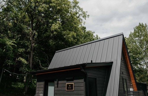 Pepin Cabin | Pine- A-frame cabin nestled on the Woods & Co Weddings + Events property