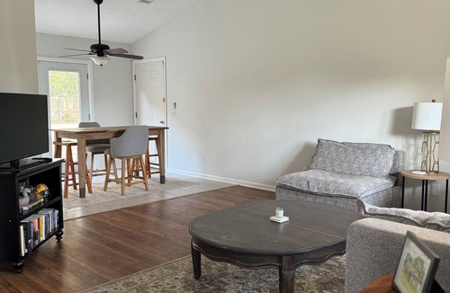 Beaufort House | Quaint Lady’s Island home with a large fenced in yard shaded by a mossy oak!