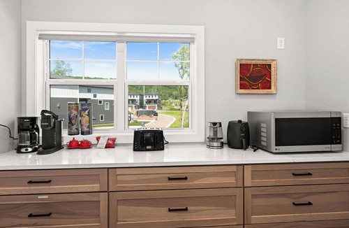 Riverside House | RiverWest Hunters Lodge - Hot Tub - River View - Dog Friendly