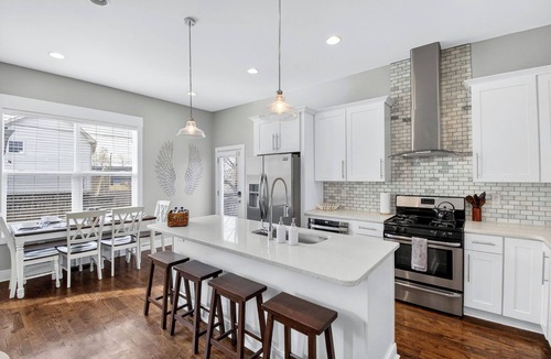North Nashville House | Speakeasy Game Room, Hot Tub, Fire Pit, King Bed Suite, TVs & Near Downtown