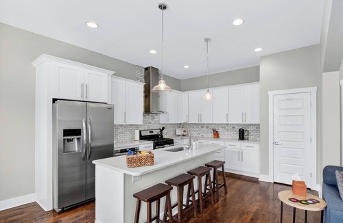 North Nashville House | Speakeasy Game Room, Hot Tub, Fire Pit, King Bed Suite, TVs & Near Downtown