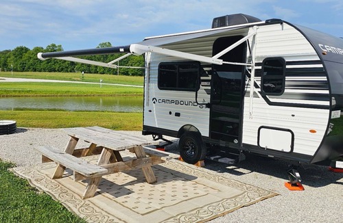 Winchester House | Stationary tiny camper in Winchester, TN with pond and mountain views.