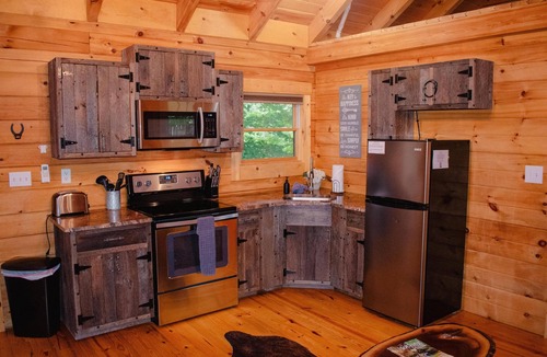 South Bloomingville Cabin | The Escape - Visit The Oasis - a cozy, pet-friendly cabin just minutes from Hocking Hills State Park. Private tot tub and serene outdoor space to reset in nature.