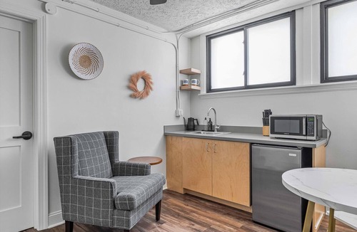 Charlotte Street House | The Sabel Collection | Downtown Asheville retreat with 16 suites parking, Wi-Fi.